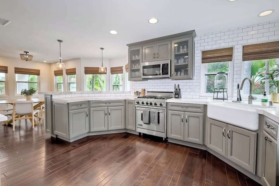 Fully stocked open chefs kitchen with tons of natural light 