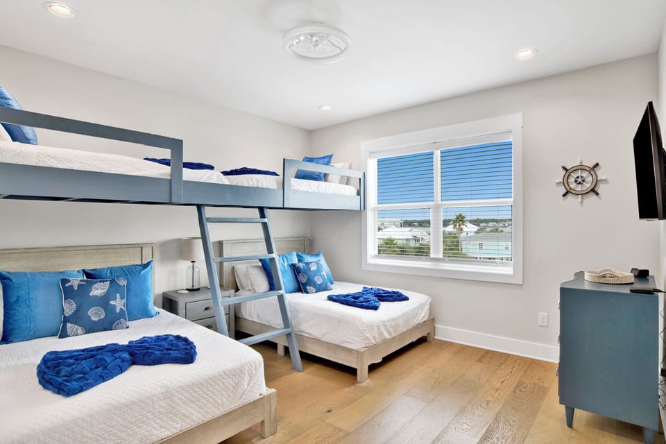 The bunk room (bedroom 4) is on the 2nd floor and has a TV