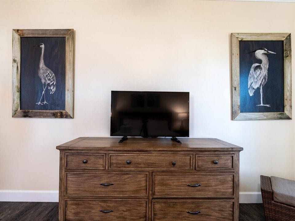 The master suite on the 3rd level with a king bed and ensuite bathroom.