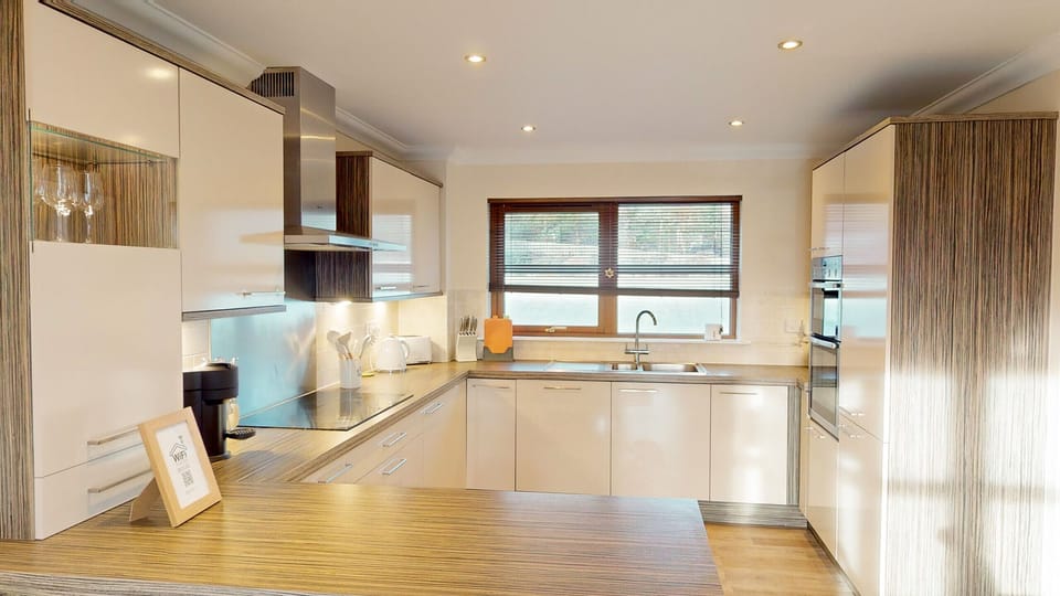 A fully equipped modern kitchen with all the appliances needed for a family holiday.
