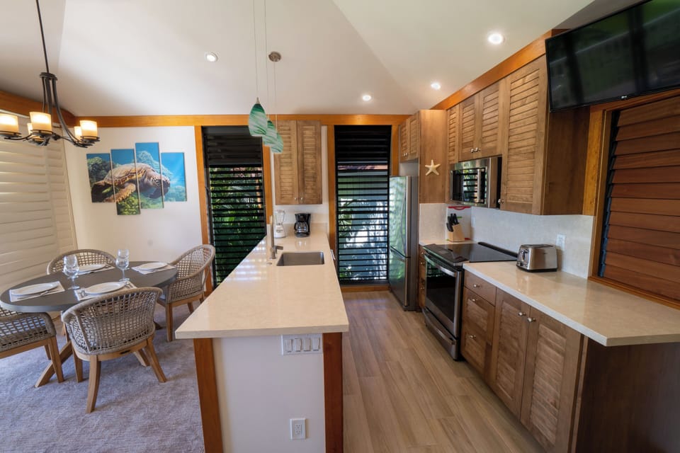 Open Kitchen area with updated appliances adjacent Dining