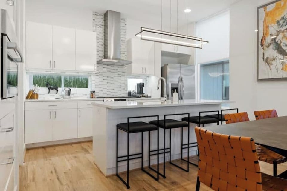 Embrace contemporary living with this open-concept living/dining area 