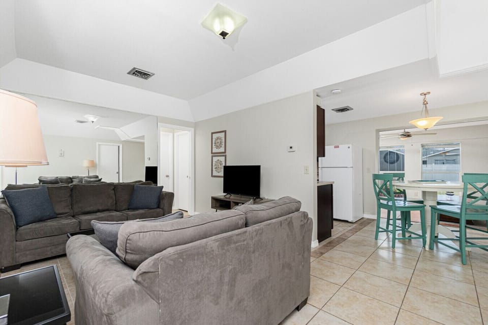 open concept living room and dining area at Englewood Florida vacation rental home