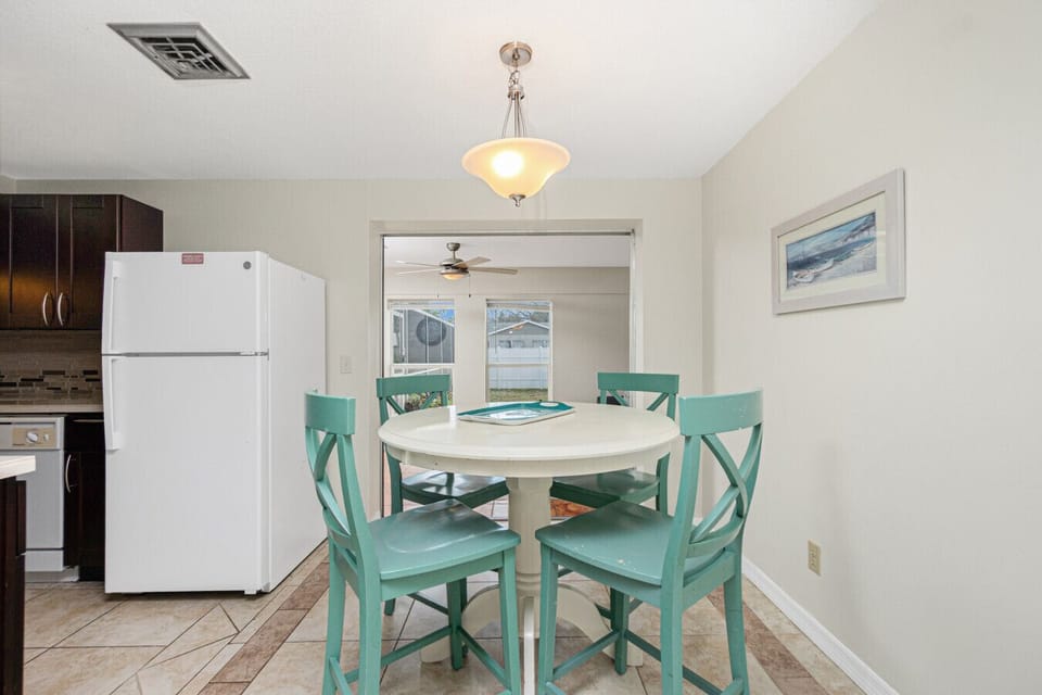 dining area with round table and seating at Englewood Florida vacation rental home