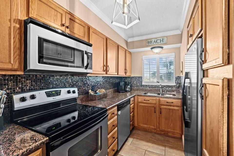 Kitchen has all appliances needed for your stay