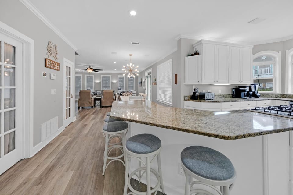 Kitchen bar overlooking the dining and living areas