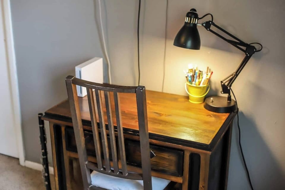 A writer's nook or a gamer's retreat? This charming desk setup is perfect for brainstorming your next novel or challenging your high score! ✍️🎮
