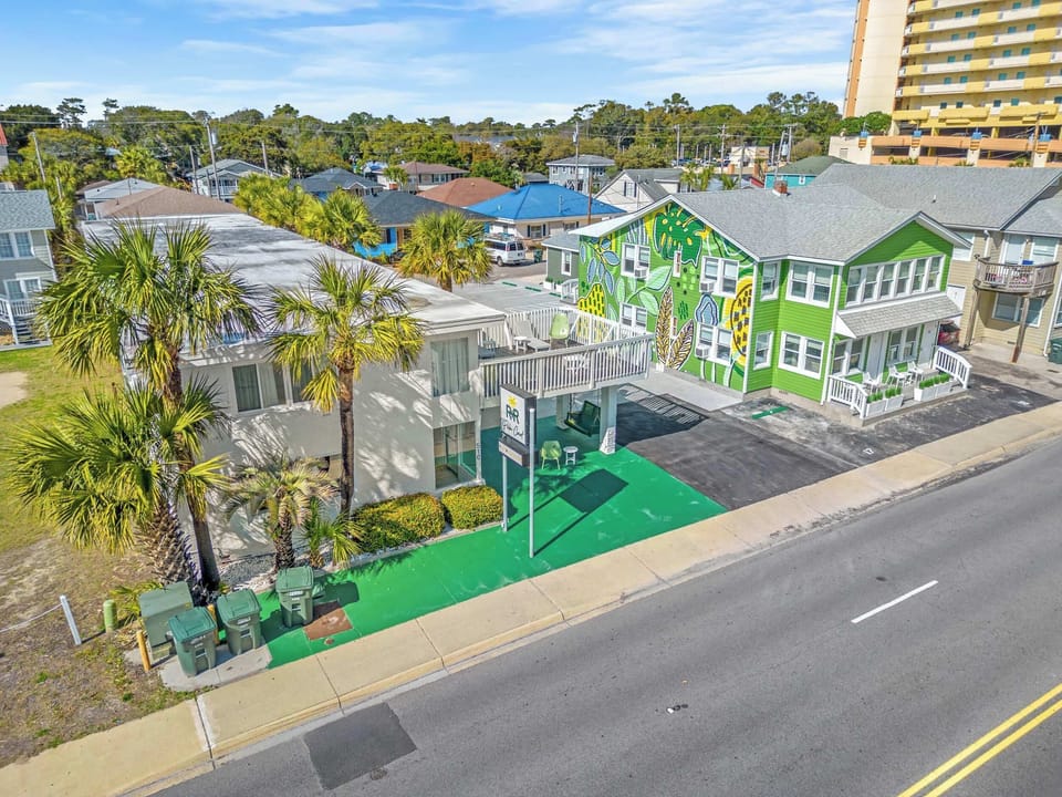 Located in a second-row building, just a short walk to the sandy shores for easy beach access.
