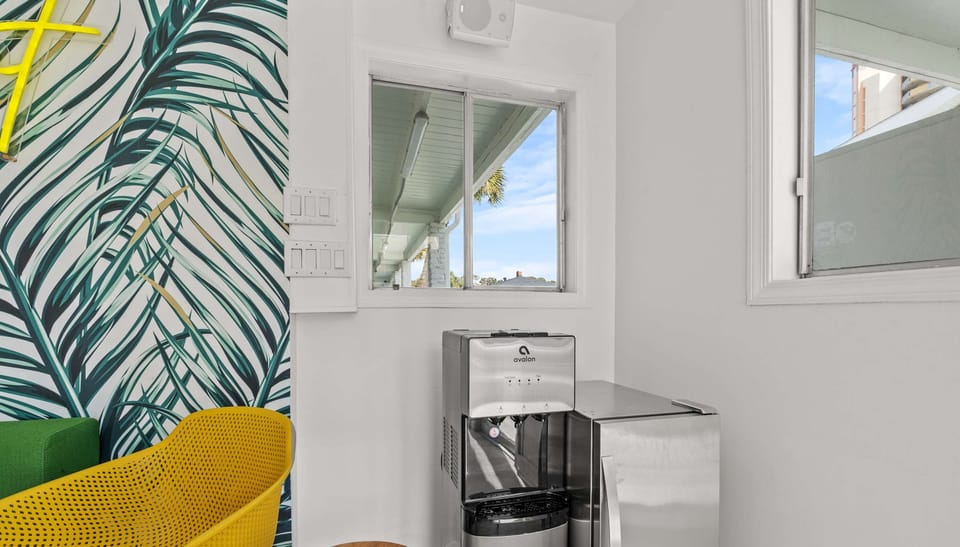 There is a filtered water dispenser in the shared lounge area