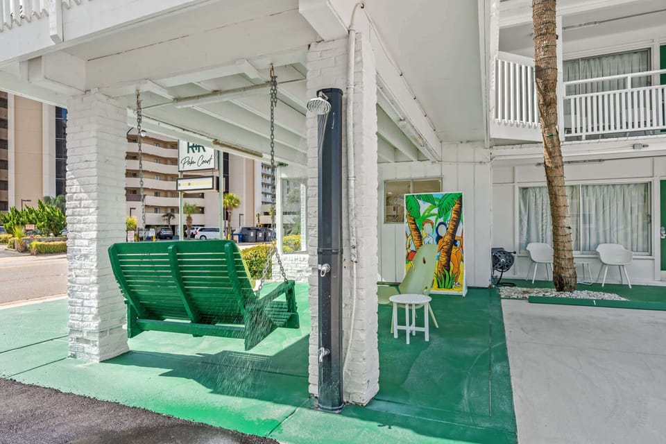 Outdoor seating area, perfect for relaxing and enjoying the refreshing ocean breeze.