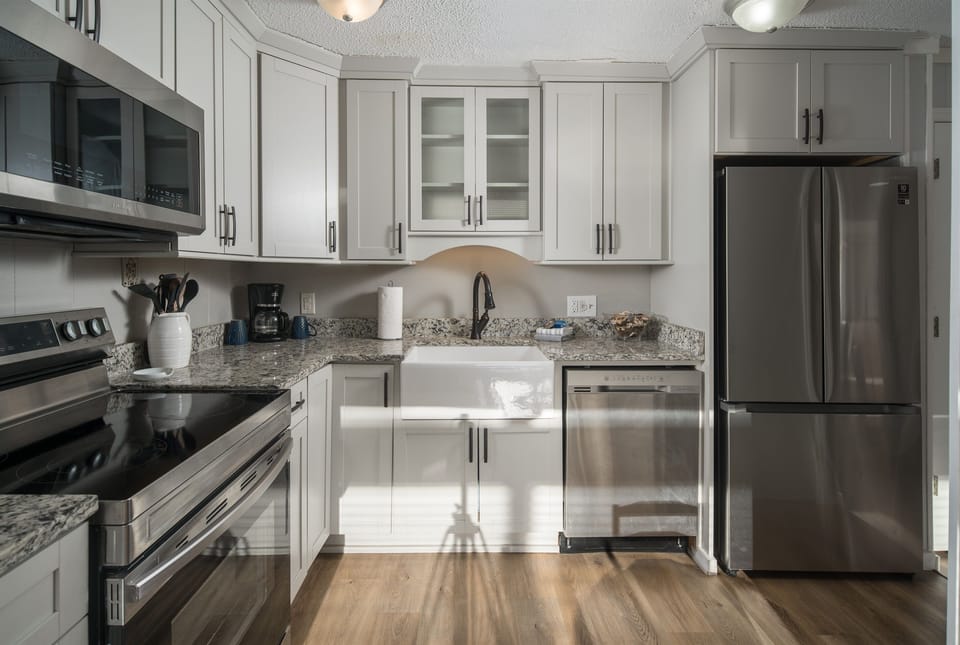 Well Stocked Kitchen with Stainless Appliances