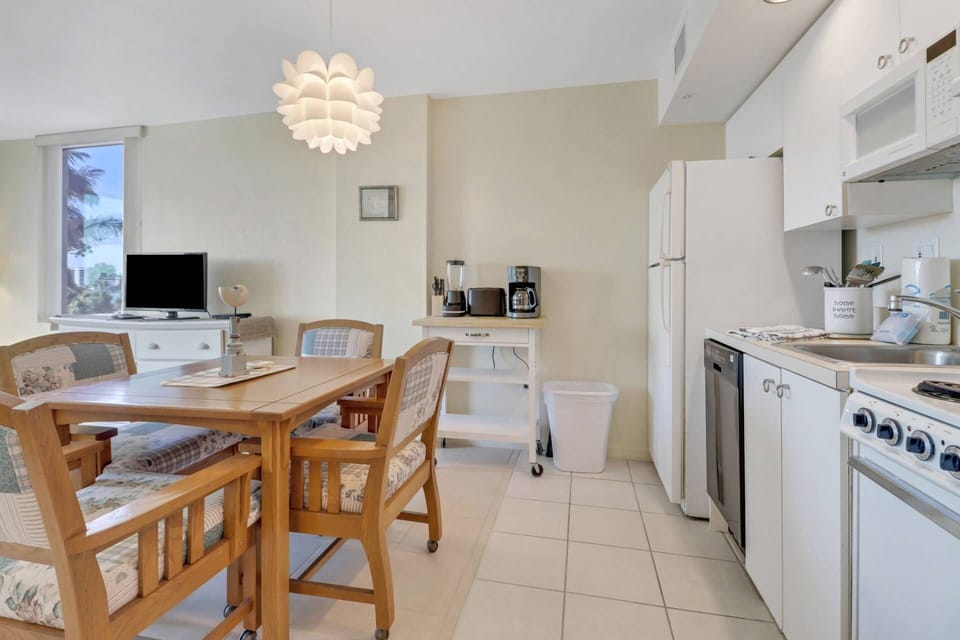 Cookware, dinnerware, kitchen tools and basic small appliances are provided, including a drip coffee maker.