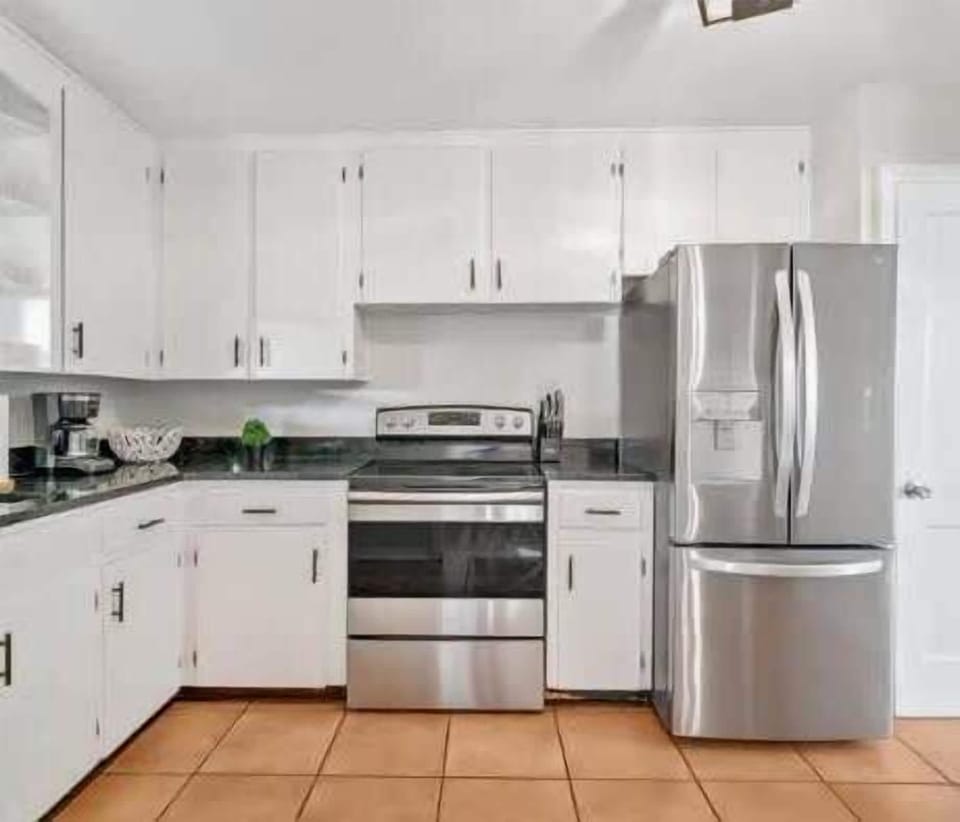 A modern and fully equipped kitchen ready for your culinary adventures 🍳✨