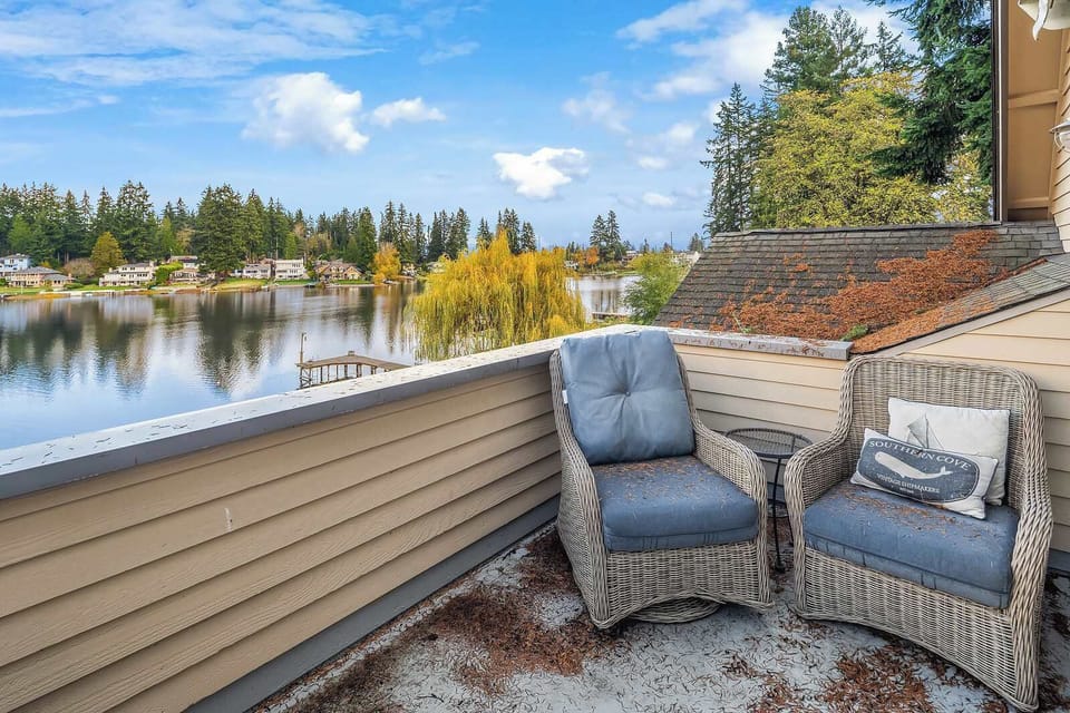 The patio offers two comfortable relaxing chairs, perfect for unwinding with a book or enjoying the peaceful surroundings. It’s an inviting space to soak up the fresh air and serene views.