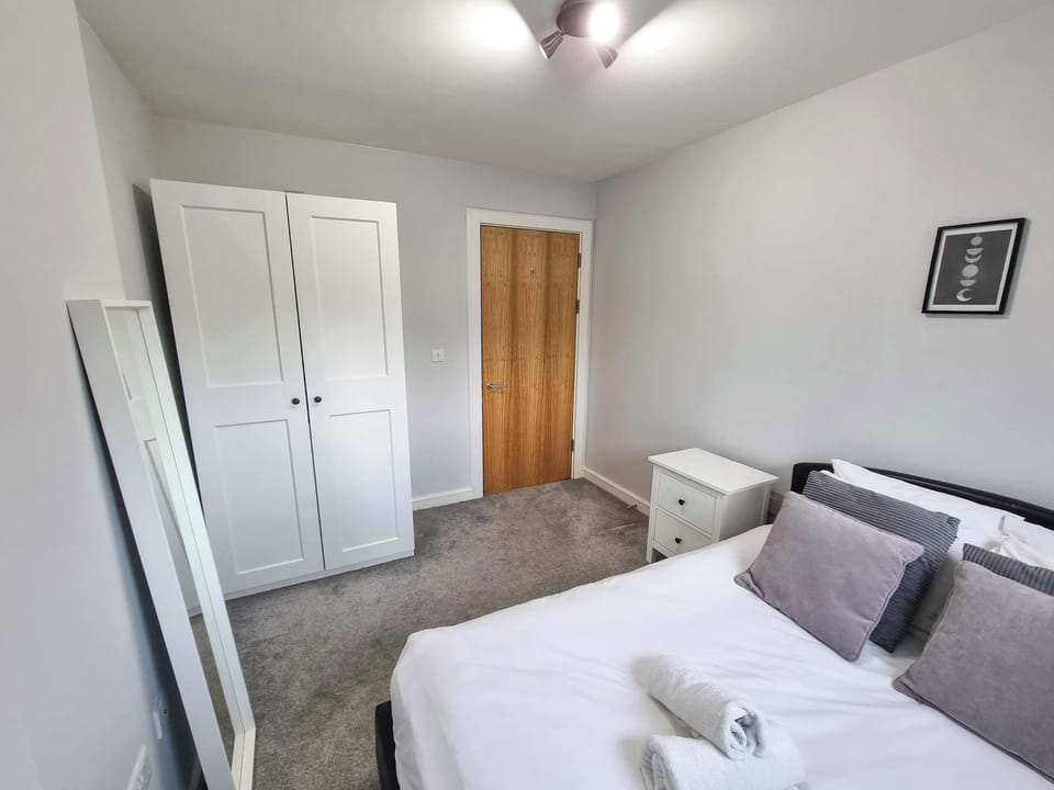 A cozy and inviting second bedroom, offering a quiet and restful space to recharge during your stay.