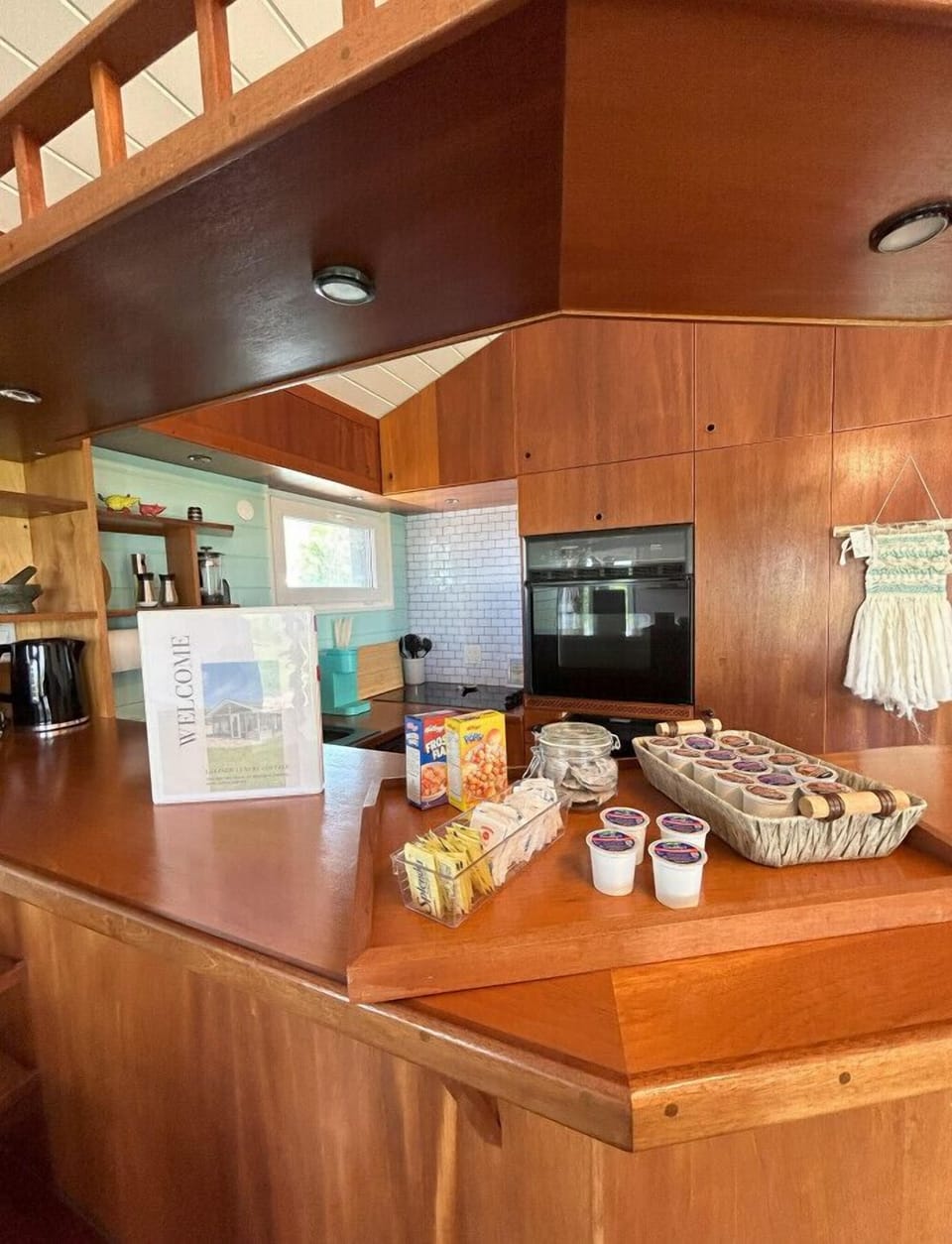 Kitchen island with coffee amenties and welcome book!