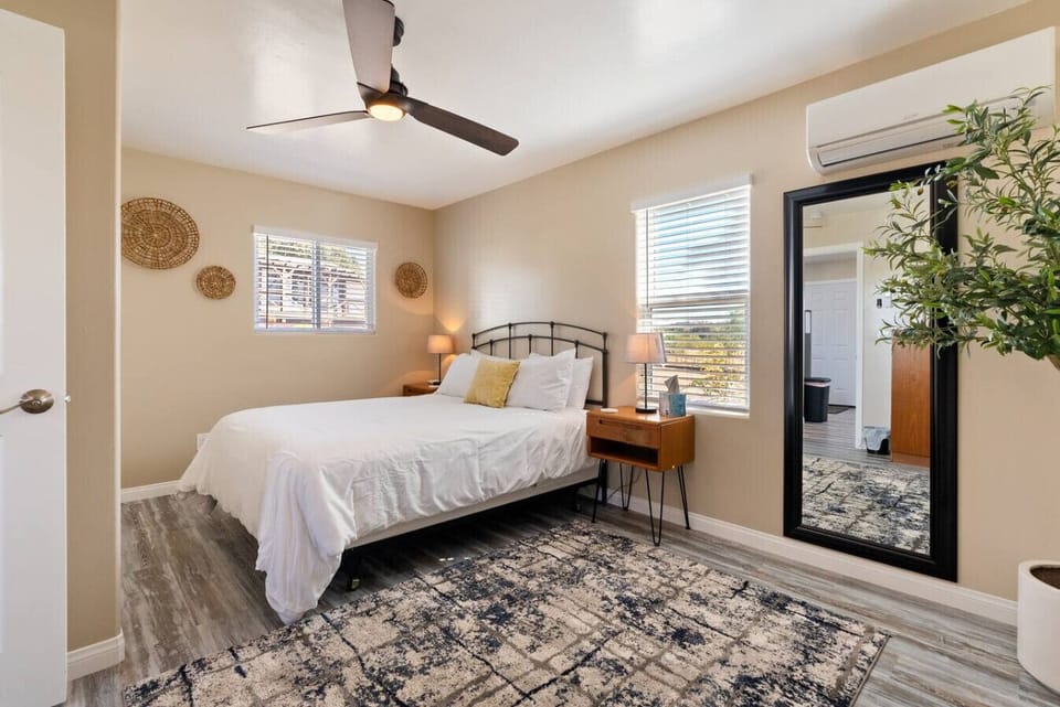 Barndominium Bedroom 2 with a comfy queen bed at River Road Retreat.