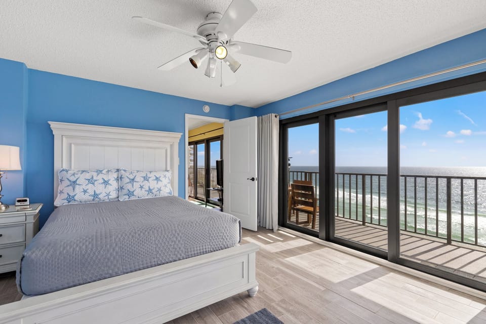 Master Bedroom with King Bed, Ensuite Full Bathroom, Direct Balcony Access and Beachfront View