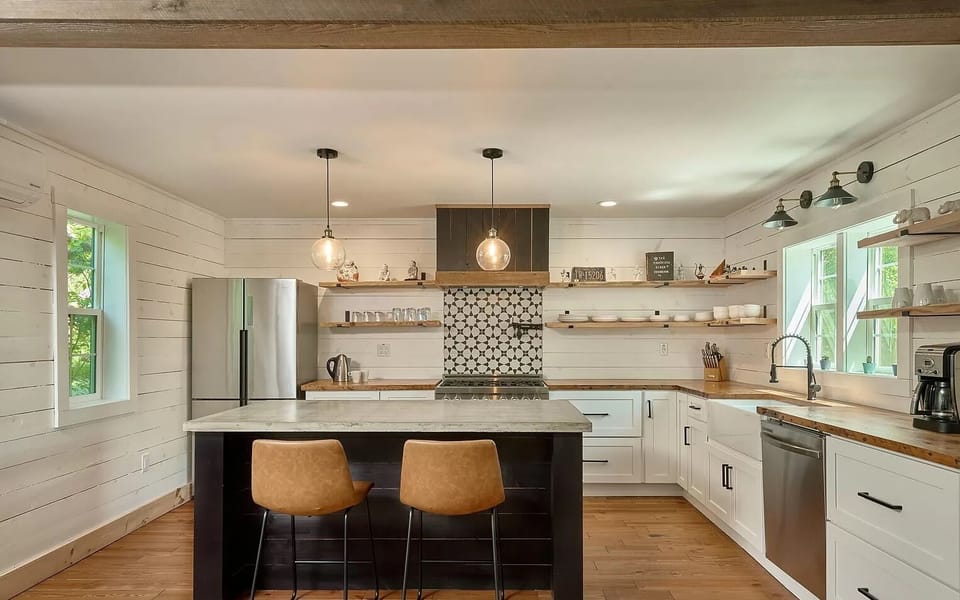 Fully stocked kitchen for cooking.