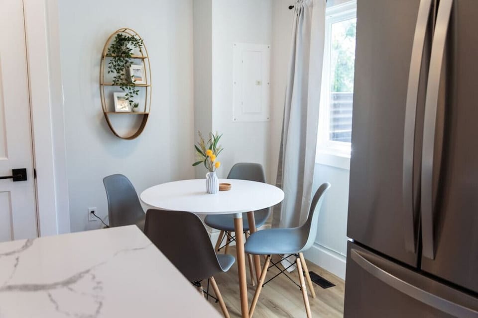 You are surrounded by tasteful decor and warm tones, making the dining room a perfect setting for any occasion.