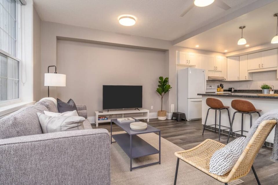 You feel at home as you settle into the living room, where the inviting atmosphere is perfect for lounging or entertaining.