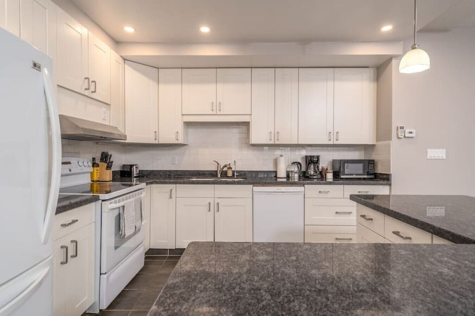 As you step into the kitchen, the clean lines and functional design make you eager to start cooking your favorite dishes.