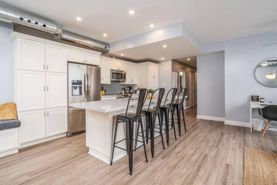 As you open the kitchen, you discover an assortment of coffee pods, and sugar, ensuring you have everything you need for a perfect morning or afternoon pick-me-up.