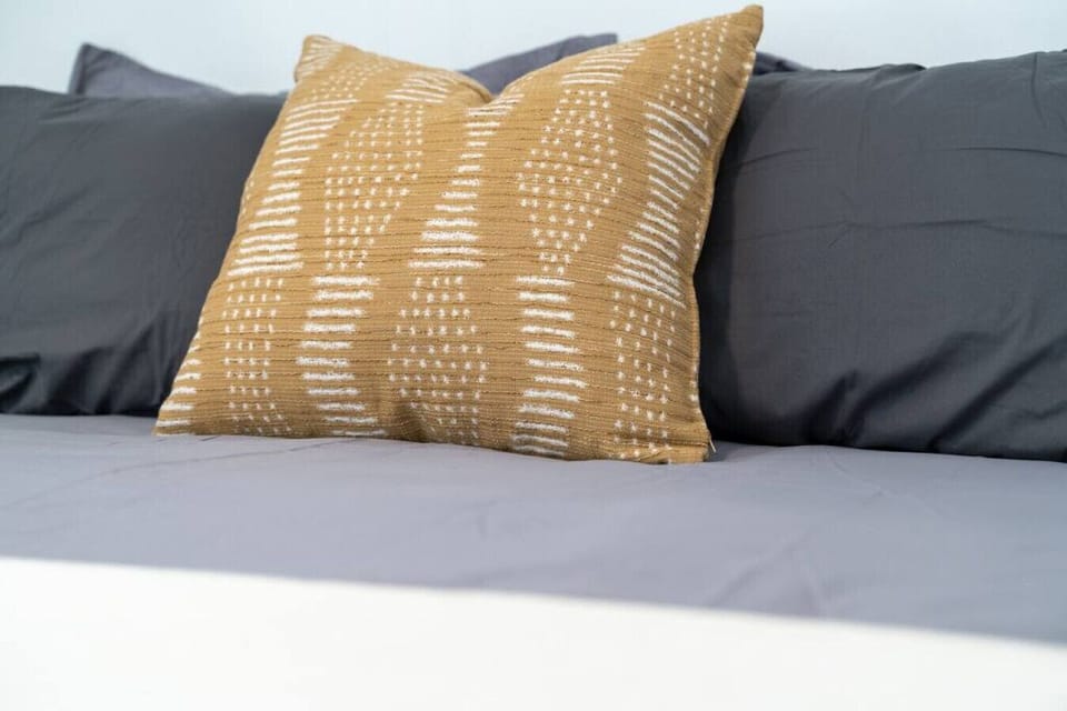 The bedroom offers a sanctuary of calm, where you can unwind and recharge in comfort and style.