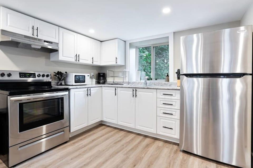 The kitchen invites you to experiment with new recipes, offering a stylish and practical space to cook and create.