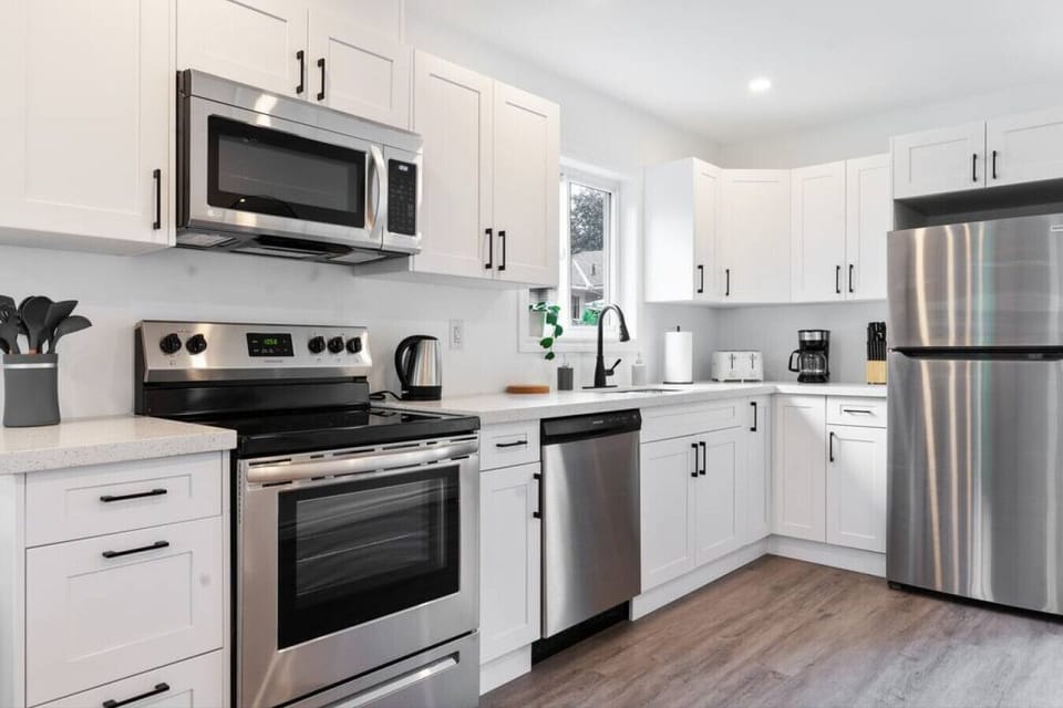 The kitchen invites you to experiment with new recipes, offering a stylish and practical space to cook and create.