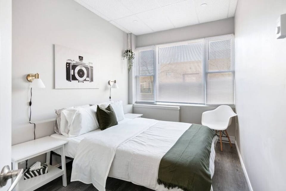 The bedroom offers a luxurious retreat, with a bed that promises restful nights and a room that feels like a private oasis.