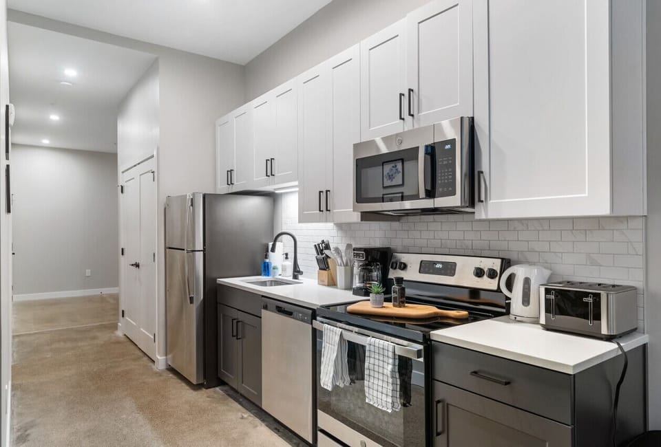 As you step into the kitchen, the clean lines and functional design make you eager to start cooking your favorite dishes.