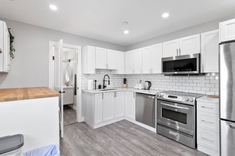 The kitchen invites you to experiment with new recipes, offering a stylish and practical space to cook and create.