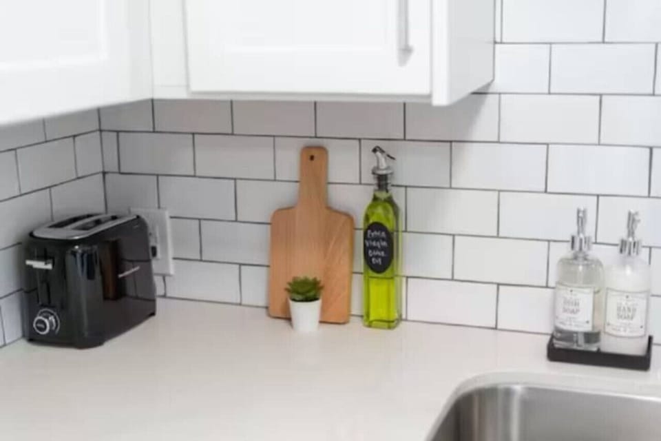 Fully equipped kitchen with all the tools you need for a perfect culinary experience. Enjoy the convenience of having everything at your fingertips!