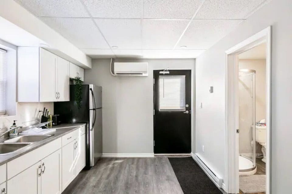 The kitchen invites you to experiment with new recipes, offering a stylish and practical space to cook and create.