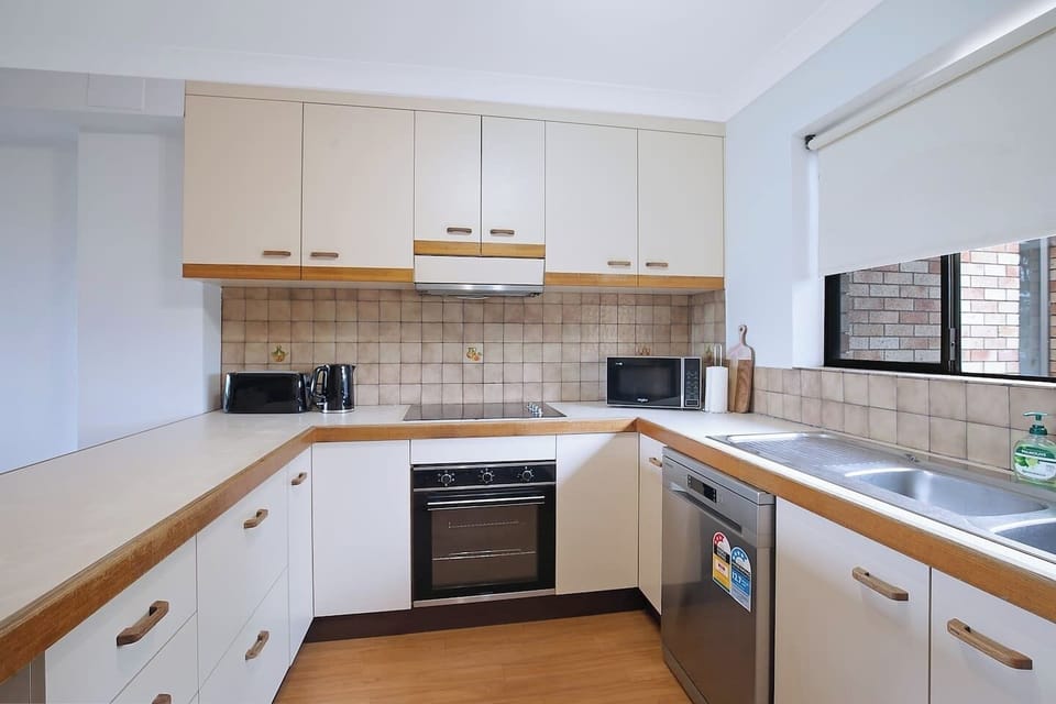 When you’re not exploring the local dining scene, a fully equipped kitchen has everything needed to prepare meals and a dishwasher for easy clean-up.