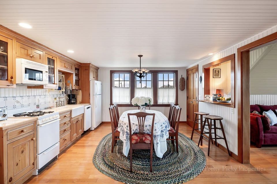 Open floor concept with kitchen and dining leading to living room or primary bedroom.