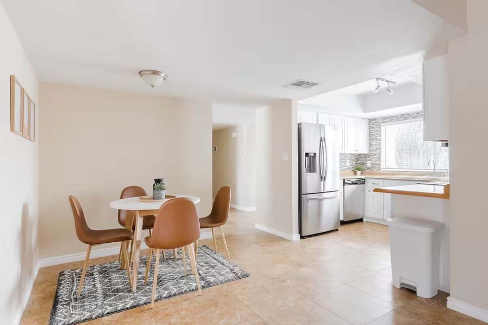 Quaint Kitchen + Dining Area