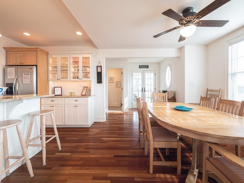 Spacious kitchen with modern appliances and bar seating, making meal prep and casual dining a breeze.