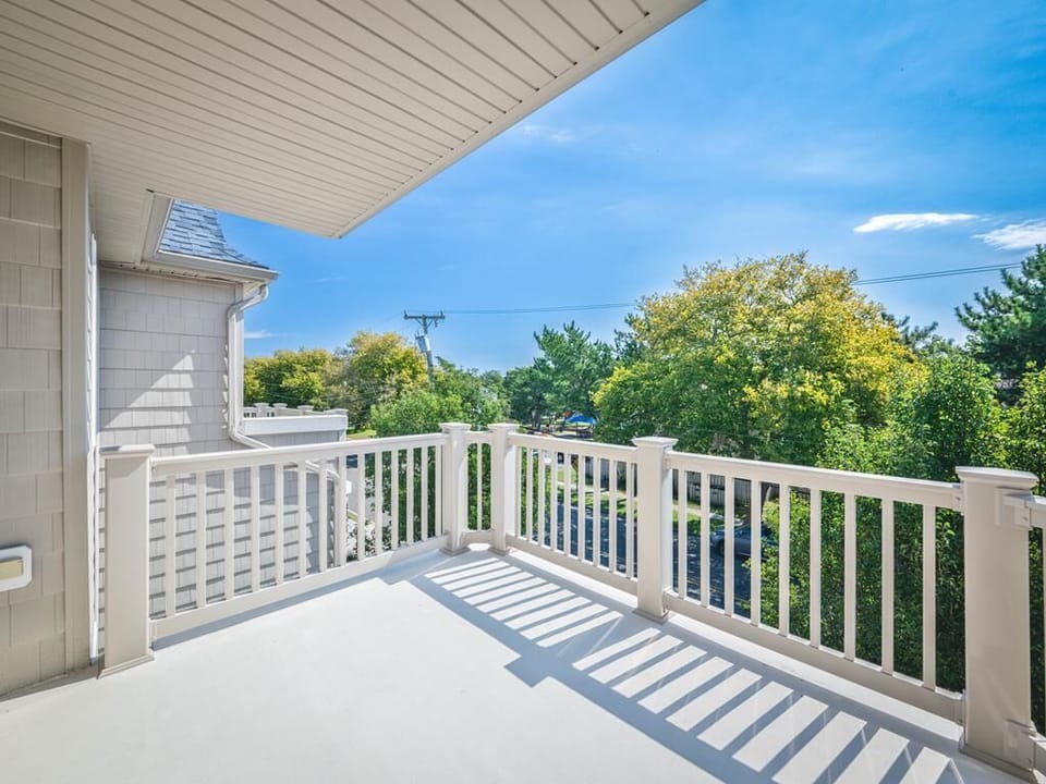 Spacious balcony offering scenic views and plenty of room to enjoy the fresh air.