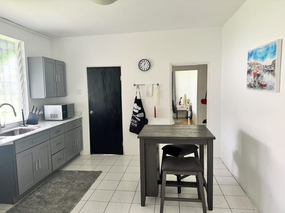 The kitchen/dining area is open and well
Lit