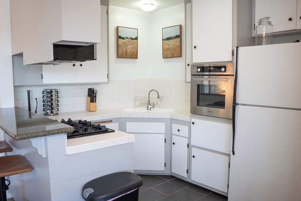 this fridge has recently been switched out with a stainless steel version