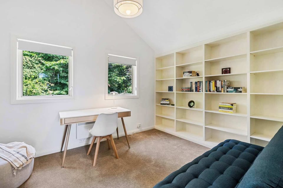 Office with books. games and sofa.
