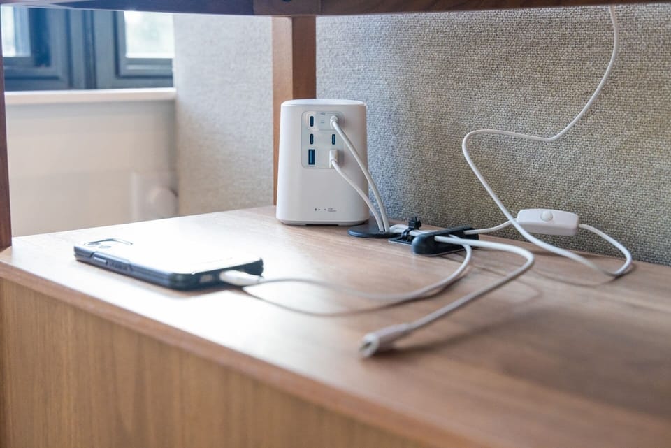Provided charging station in the console table. USB-C and lightning cords are included. Additional open ports can be used with guest cords. Each bedroom includes a single USB charging brick. 