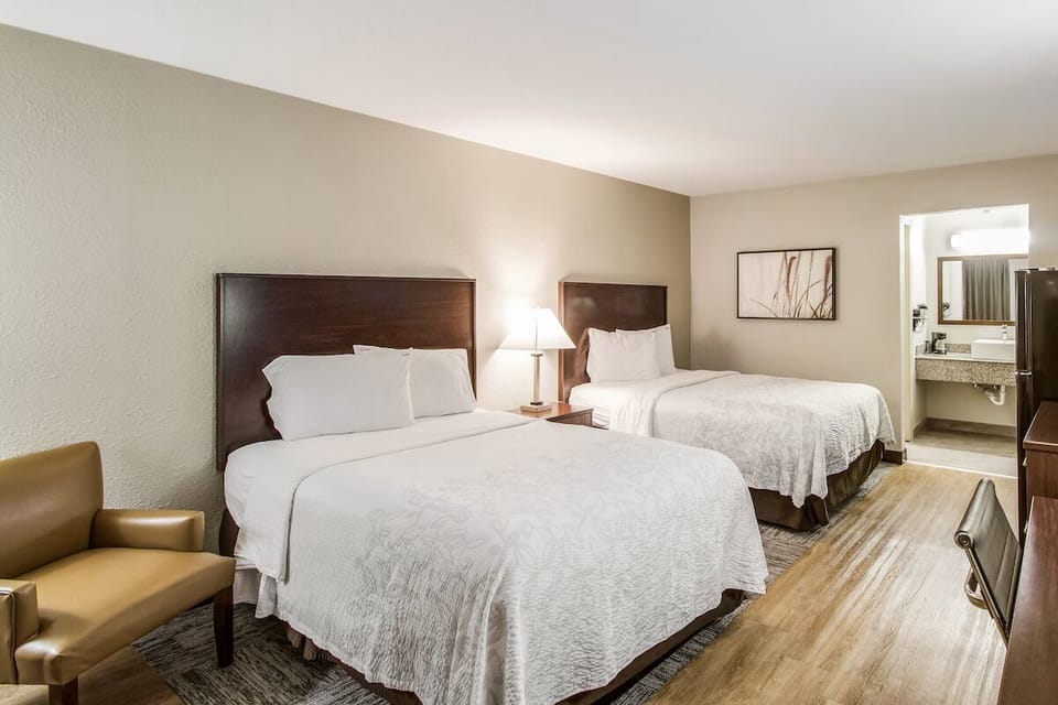 Relax after adventures with two plush beds and warm lighting.