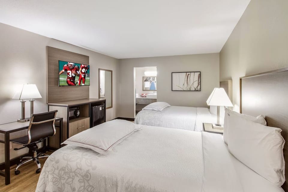 Kick back with in-room microwave, mini-fridge, and big TV.