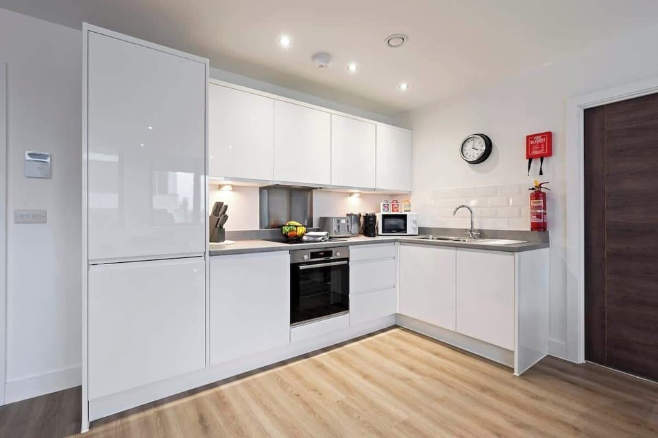 The fully equipped kitchen has everything you need for a short or long term stay whilst away in Manchester.
