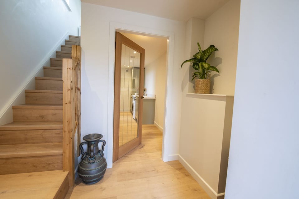 Ground floor: Hallway leading to the utility room and cloakroom
