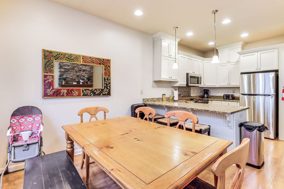 Dining Area | Main Level | High Chair | Open Floor Plan