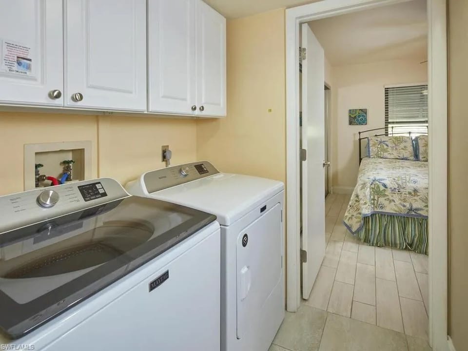 Full-size washer and dryer. Laundry supplies are provided.